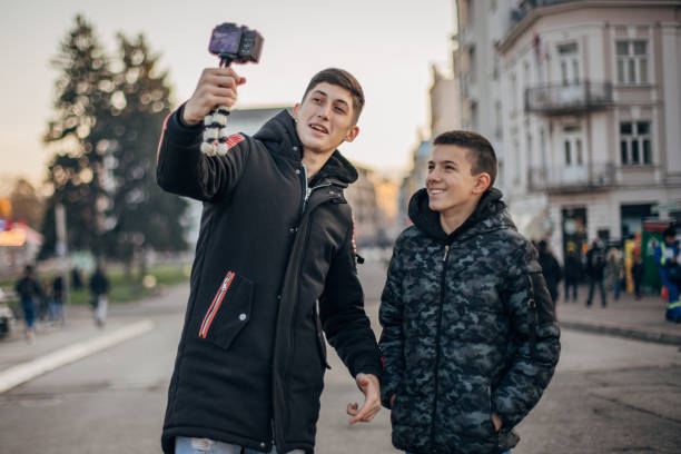 Young teenage boys vlogging