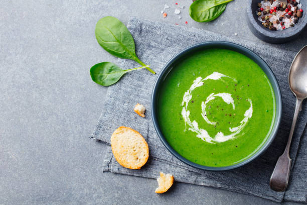 istock Spinach soup with cream in a bowl. Top view. Copy space. 1204162650