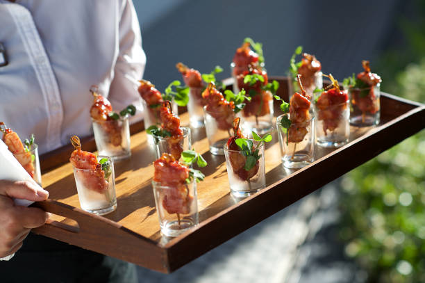 istock Glazed Grilled Spicy Pork Skewer Appetizers being served 1204163410