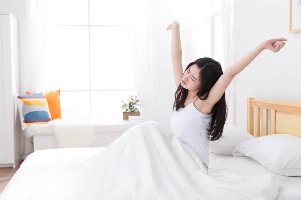 istock Young women get up 1204163951