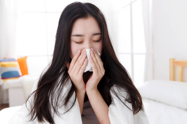 istock Young women catch cold 1204165260