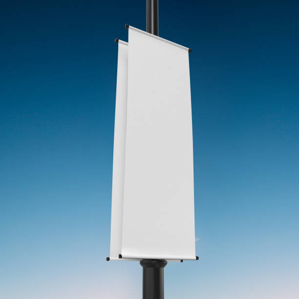 istock White Lamp Post Banner Mockup, 3d Rendering Isolated on Blue sky Background 1204165261