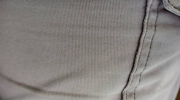 istock Gray fabric texture, with folds, selectively focused 1204165967
