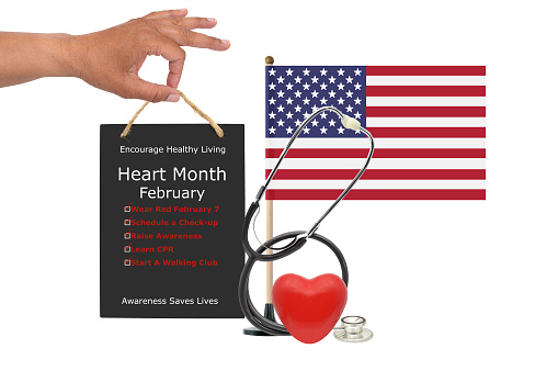 Heart Month Sign, Red heart, Stethoscope and American flag on white background