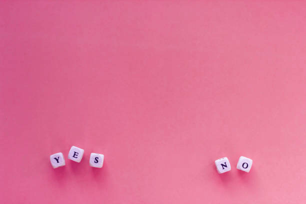 istock Yes or no choice on letter cubes. Choice, opinion, voting concept. Copyspace for text 1204167102