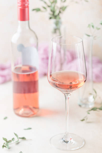 istock Glass and bottle of rose wine 1204169403