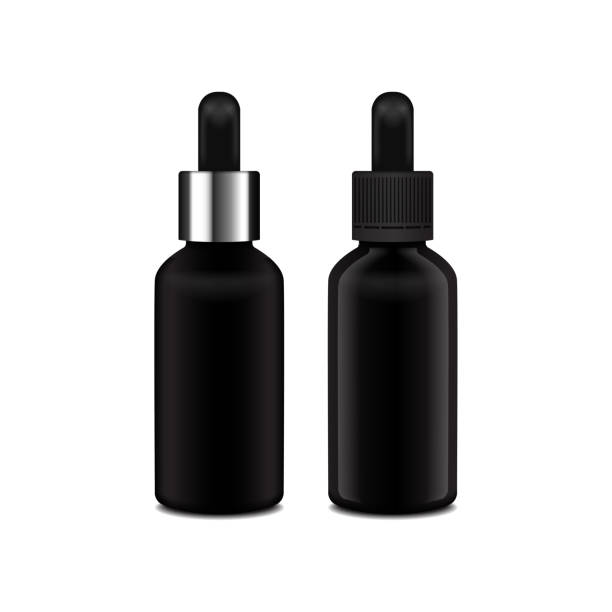 istock Realistic essential oil. Set of black matte and glossy bottle. Mock up bottle cosmetic or medical vial, flask, flacon 3d illustration 1204169525