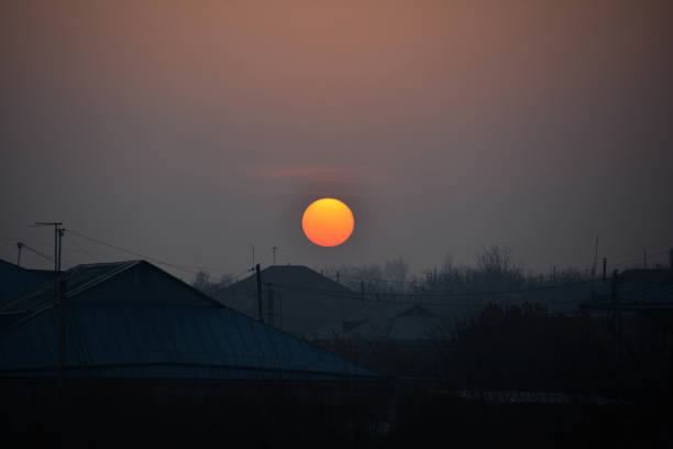 istock Burning red sun goes to the horizon 1204169666