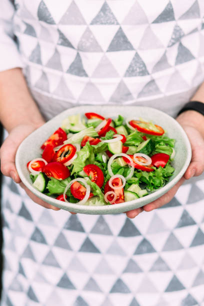 istock Vegetarian salad with tomatoes, cucumber and sweet pepper 1204171663