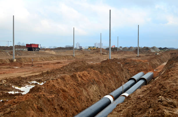 istock Laying underground storm sewers at a construction site 1204172197