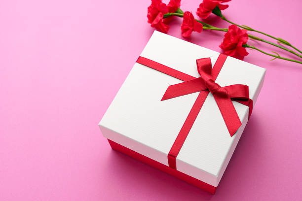 istock Mothers day gift and carnation flower. 1204172316