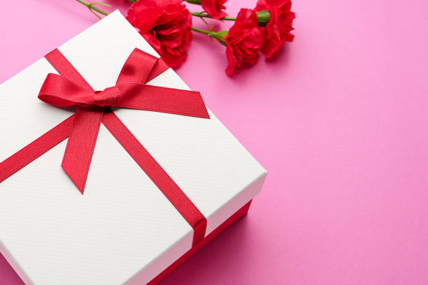 Mothers day gift and carnation flower.