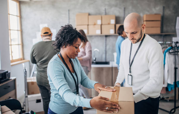 istock Diverse group of people arranging customers orders for drop shipping 1204172642