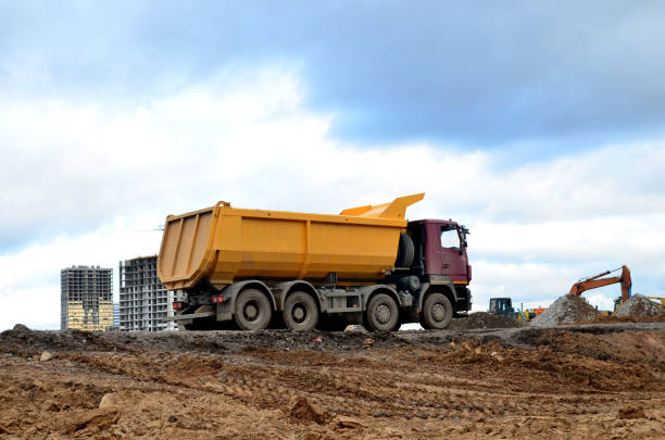 istock Dump truck transports sand and other materials at construction site 1204174615