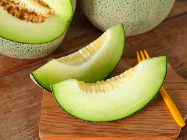 istock Pieces of green net melon fruit. 1204177849