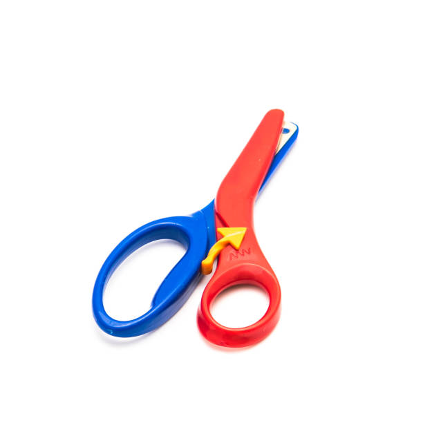 istock Preschool scissors with training lever for kids isolated on white 1204178874