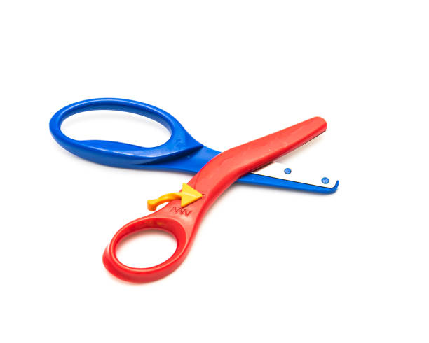istock Preschool scissors with training lever for kids isolated on white 1204178937