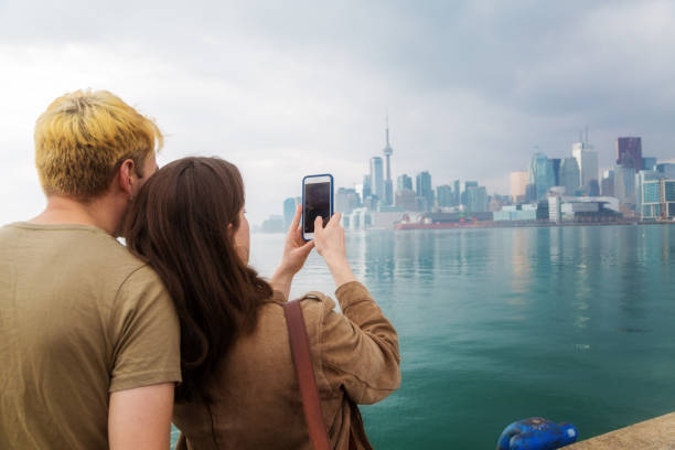istock Couple with Toronto skyline 1204179480