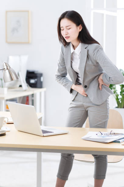 Business woman stomach pain - fotografia de stock