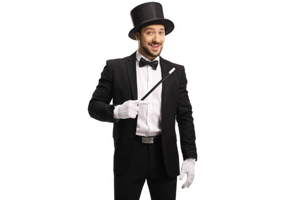 istock Male magician standing with a magic wand 1204185047