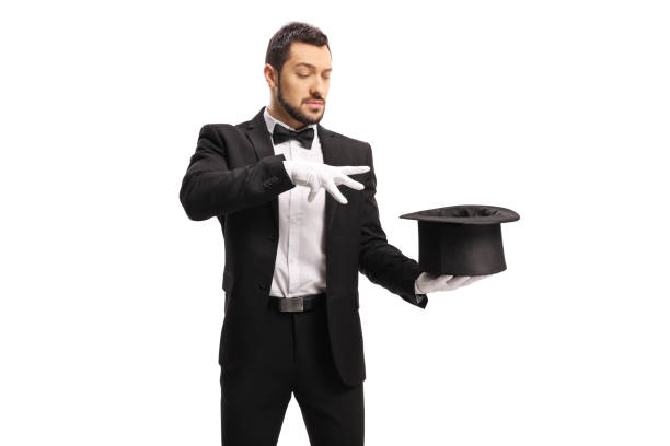 istock Male magician performing a trick with hands and a top hat 1204185051