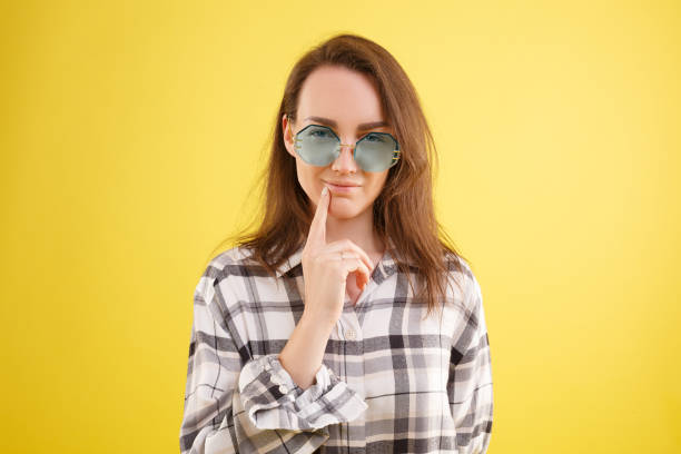 istock Beautiful young girl posing in the studio 1204185122