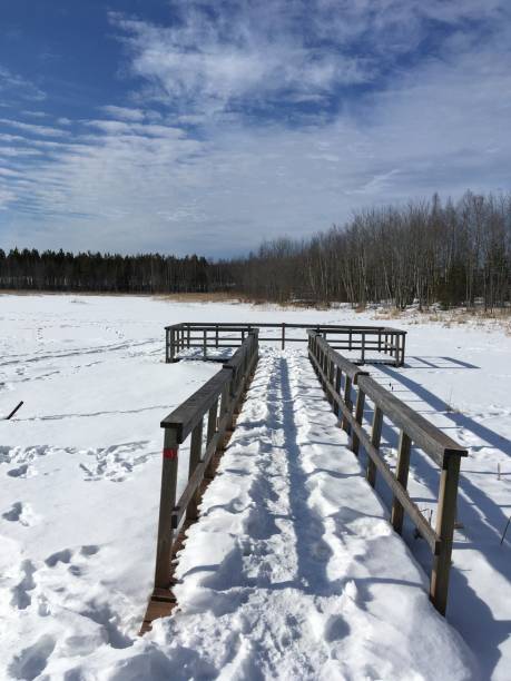 istock Snowy wood footbridge in Nature 1204185189