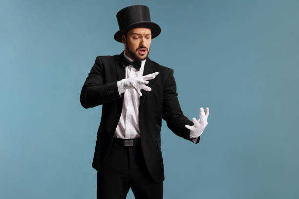 istock Male magician performing a trick with hands 1204186039