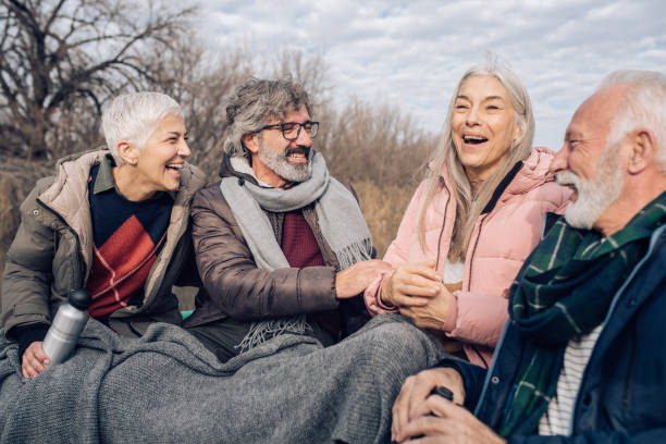 istock Seniors relaxing while sailing the river and having fun together 1204189087