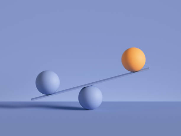 istock 3d render, balls placed on scales, isolated on violet background. Primitive geometric shapes. Balance, comparison metaphor. Modern minimal design 1204189843