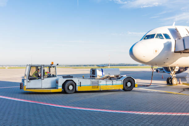 istock The aircraft towing system at the airport 1204190848