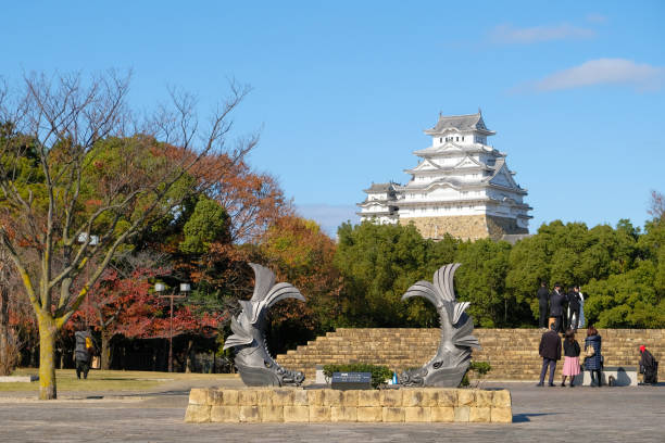 Himeji, Japan - 26 November 2019- The Himeji castle with statue at the front, an Unesco World Heritage site, is the most visited castle in Himeji, Japan.