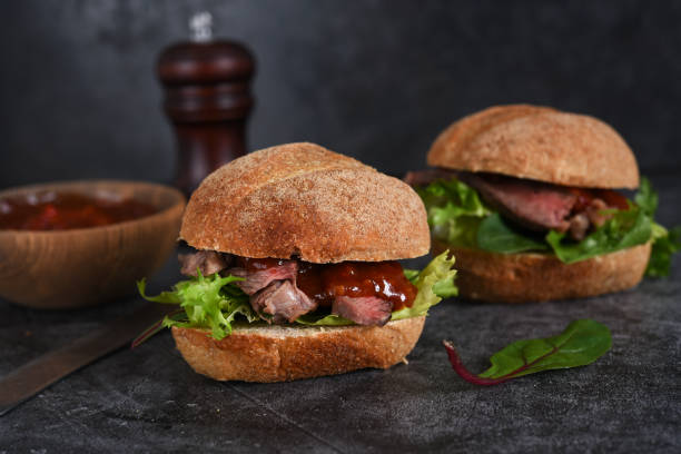 istock Bun with beef, salad and sauce. Hamburger. 1204191587