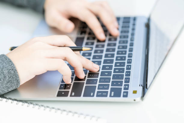 istock Woman working at home office using laptop searching web, browsing information 1204192692