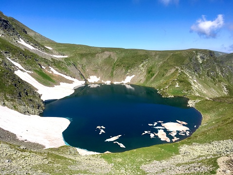 Rila mountains, Bulgaria. This lake is called the Tear. It is the second highest of the seven lakes located neat each other - 2440 m (8010 ft) above sea level.