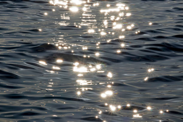 istock evening sun and sparkles in the sea 1204198775