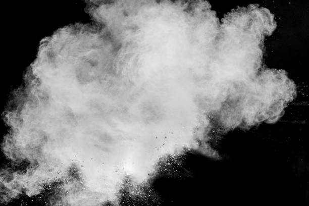 istock White powder explosion isolated on black background.White dust particles splash. 1204200668