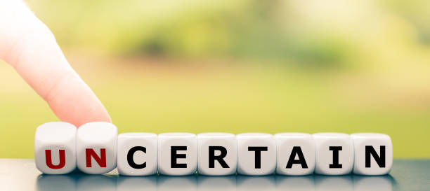 istock Hand turns dice and changes the word 