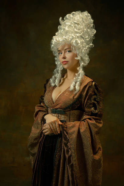 istock Medieval young woman in old-fashioned costume 1204211444