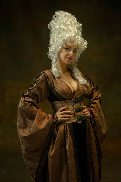 istock Medieval young woman in old-fashioned costume 1204211479