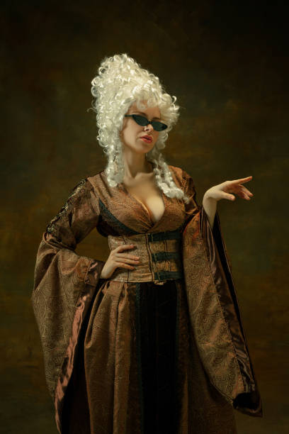 istock Medieval young woman in old-fashioned costume 1204211505