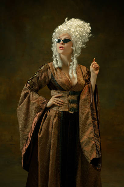 istock Medieval young woman in old-fashioned costume 1204211516
