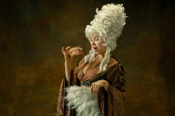 istock Medieval young woman in old-fashioned costume 1204211583