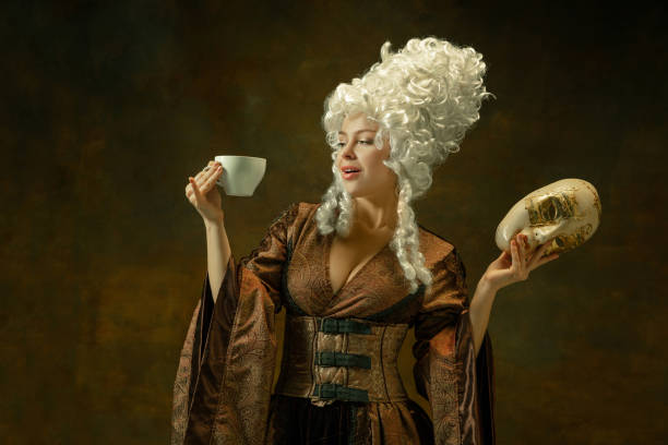 istock Medieval young woman in old-fashioned costume 1204211591