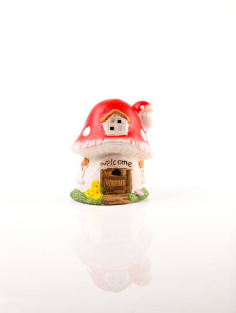 istock Mushroom toy house isolated on white background 1204212906