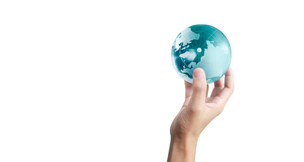 istock Globe ,earth in human hand, holding our planet glowing 1204214565