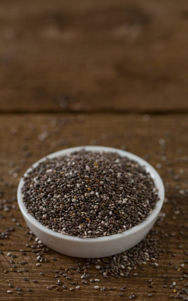 istock Chia seeds on a wooden surface 1204229130