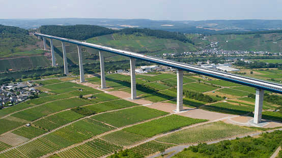 Construction site of Hochmoselbruecke B50, bridge over Mosel valley - aerial view