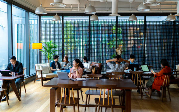 istock Asians Millennials busy working in co-working space. 1204231570