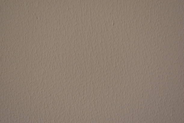 istock Concrete floor covering with cracks and inclusions 1204233307